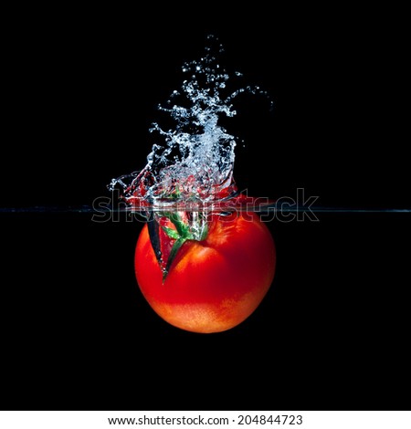 high speed photography tomato splash in water