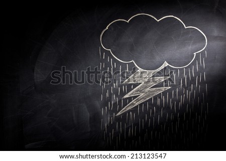 cloud with rain and flash on blackboard