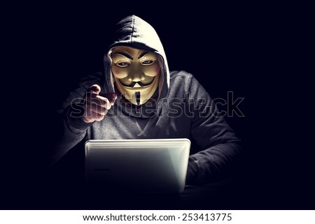 portrait of hacker with mask