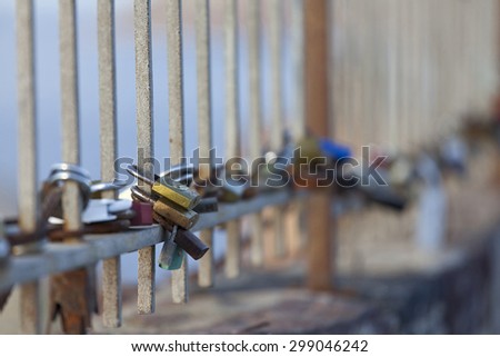 Oia,Santorini, GREECE - June 14, 2015:padlocks with love message left on the fence of the castle of Oia