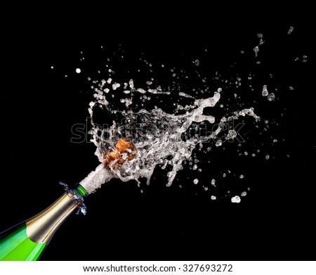 closeup of popping champagne and splash