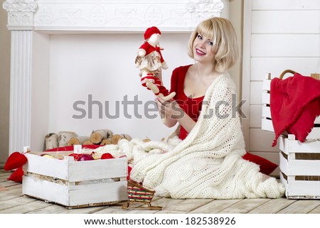 girl sitting by the fireplace