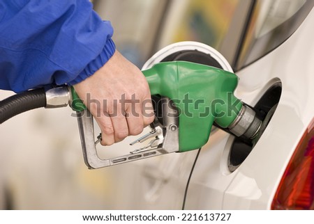 Horizontal Shot Of Pumping Gas/ Pumping Precious Gas Or Petrol
