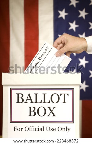 Hand Voting At Ballot Box/ Vertical Shot