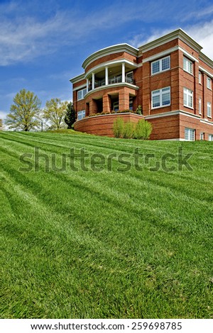 New Mowed Lawn In Front Of Unidentified City Building