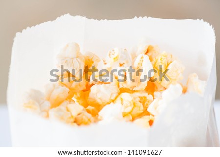 Fresh classic butter popcorn in paper pack
