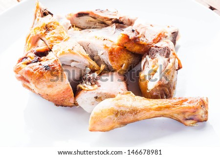Grilled chicken on plate, stock photo
