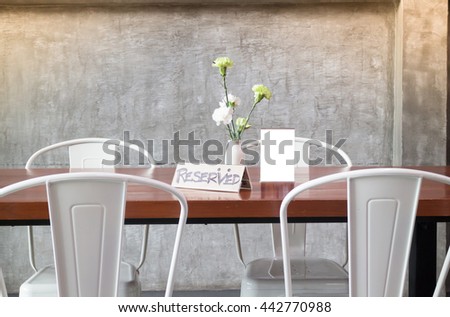 Mock up frame on table in bar restaurant cafe, stock photo