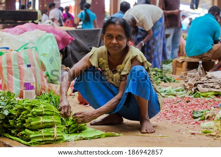 Sri Lanka - Seller on street market in Matara, April 2, 2014
