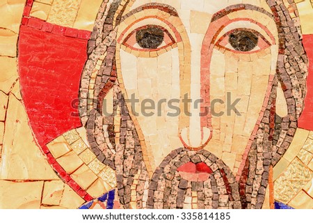 Detail of the face, eyes of jesus Christ in a mosaic