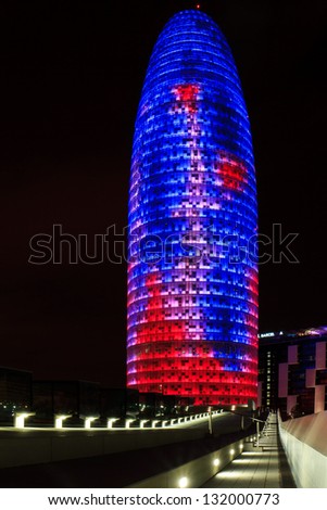 BARCELONA - MARCH 2: Illuminated Torre Agbar at night on March 2, 2013 in Barcelona, Spain. This modern building was designed by the famous architect Jean Nouvel.