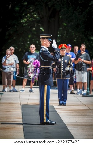 WASHINGTON, D.C. - JUNE 20, 2014: Changing of the Guard Ritual at The Tomb of the Unknown Soldier at Arlington National Cemetery. The Tomb is guarded 24 hours a day, 365 days a year, in any weather.
