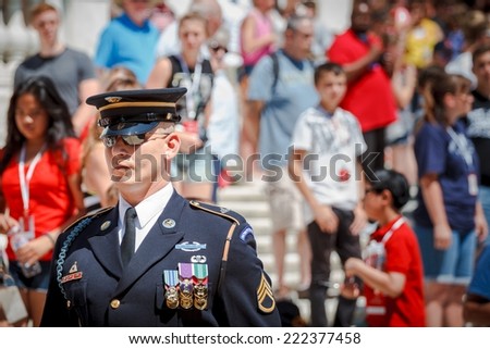 WASHINGTON, D.C. - JUNE 20, 2014: Relief commander during Changing of the Guard Ritual at The Tomb of the Unknown Soldier at Arlington National Cemetery.