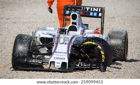 BARCELONA - FEBRUARY 19: Broken Williams Martini Racing F1 car at Formula One Test Days at Catalunya circuit on February 19, 2015 in Barcelona, Spain.