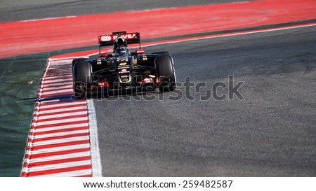 BARCELONA - FEBRUARY 22: Romain Grosjean of Lotus F1 Team at Formula One Test Days at Catalunya circuit on February 22, 2015 in Barcelona, Spain.