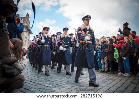 PRAGUE, CZECH REPUBLIC - APRIL 4: Soldiers of Prague Castle Guard march to perform Changing of the Guard Ceremony on April 4, 2015 in Prague. Ceremony takes place daily at noon.