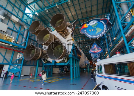 [2014-12-14]Apollo/Saturn V Center at Kennedy Space Center, Orlando, Florida. This is the rocket used to go to the moon in 1969. Rockets and visitors are visible in the photo.