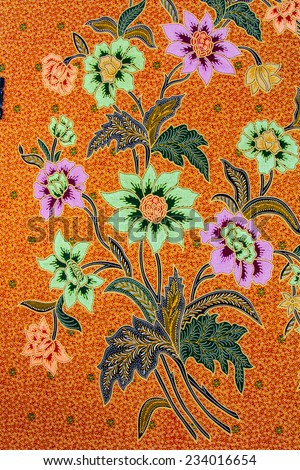 Batik design in Thailand for traditional clothes. Colorful orang tone background and flower style. For creator design illustrator.