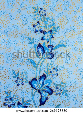 Batik design in Thailand for traditional clothes. Colorful blue tone background and leaf style. For creator design illustrator.