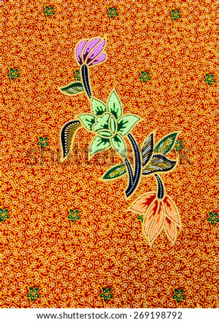 Batik design in Thailand for traditional clothes. Colorful orange tone background and flower style. For creator design illustrator.