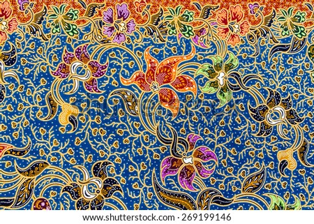 Batik design in Thailand for traditional clothes. Colorful blue tone background and flower style. For creator design illustrator.