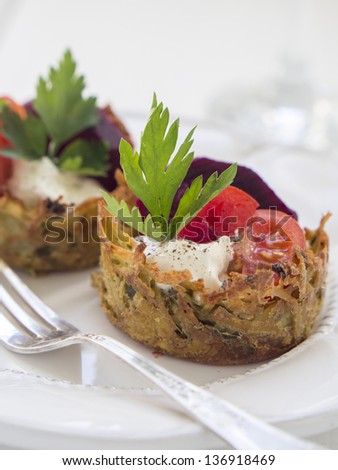 Healthy eating: baked, no fat version of potato pancakes served with vegetables.