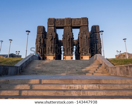 TBILISI, GEORGIA - JUNE 23: The Chronicle of Georgia (Stonehenge) in Tbilisi, Georgia, on June 23, 2013 at sunset. The Chronicle shows the history and religious believes of the country.
