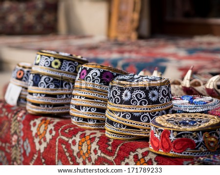 Taqiyah, traditional muslim hats sold on a local market in Icheri Sheher (Old Town) in the Center of Baku, Azerbaijan. Horizontal orientation.
