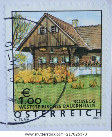 AUSTRIA - CIRCA 2003 : A stamp printed in Austria shows house and pumpkin, circa 2003