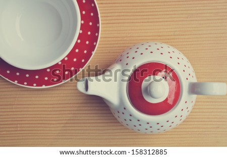 Vintage Red polka dot kettle and cup of tea