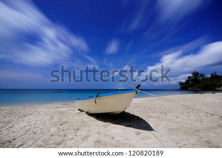 Single Boat with Moving Cloud Under Moon Light
