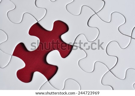 Close Up Of Missing Puzzle On Red Background, Selective Focus
