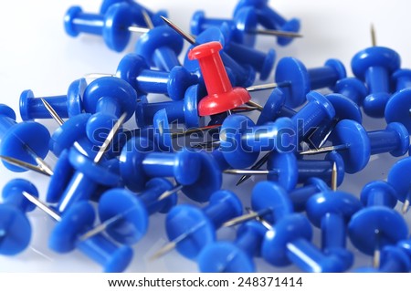 Standing of Red Push Pin On Crowd Blue Push Pins, Leadership Concept and Selective Focus