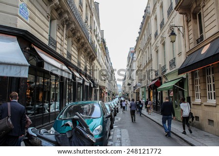 PARIS, FRANCE - SEPTEMBER 02, 2012: Typical apartment buildings at the quay of the river Seine in Paris, capital of France