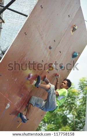 PUTRAJAYA, MALAYSIA - MAY 4: A contestant climbs the wall \