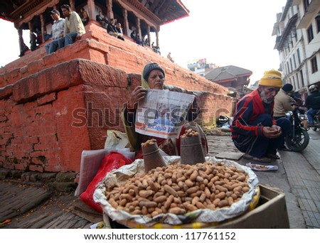 KATHMANDU, NEPAL - FEBRUARY 2 : Local people on the street sell local produce. The basic branch of economy in Nepal - agriculture (76 % of working population), February 2, 2012 in Kathmandu, Nepal
