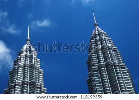 KUALA LUMPUR - FEB 19: Petronas Twin Towers on February 19, 2011 in Kuala Lumpur. Petronas Twin Towers were the tallest buildings in the world from 1998 to 2004, but remain the tallest twin buildings