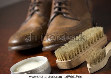 Male shoes with shoemaker tools