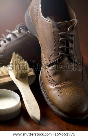 Male shoes with shoemaker tools
