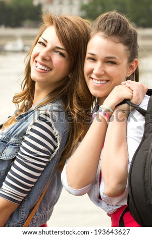 Portrait of two women laughing