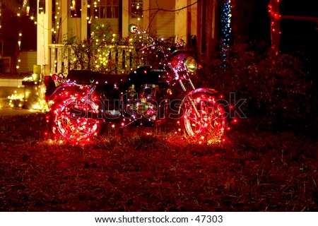 Christmas lights adorn motorcycle on 37th Street, Austin, Texas