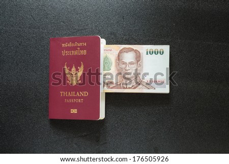 Thailand passport with money for travel
