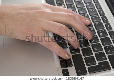 female hand on keyboard