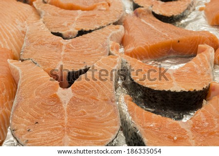 Cutlets of salmon. fish for sale in shop. fish chops. salmon background.