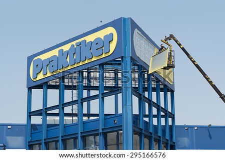Varna, Bulgaria - July 10, 2015: dismantle a logo of Praktiker of their market in Varna, Bulgaria. Praktiker was a hypermarket chain filed for insolvency in 2013.