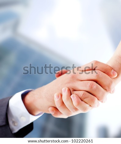 Business handshake closing an important deal