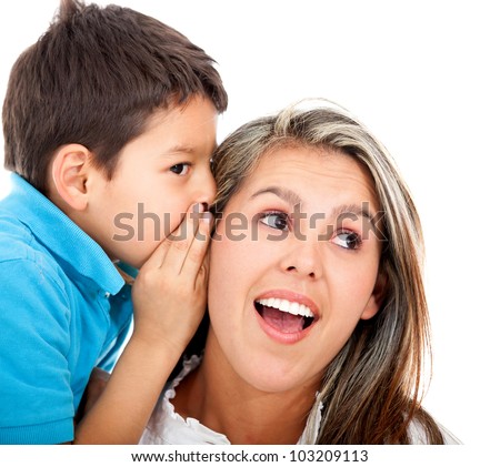 Boy telling his mother a family secret - isolated over a white background