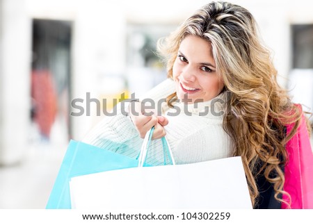 Beautiful female shopper at the shopping center