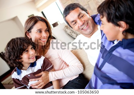 Family talking and a boy telling a story