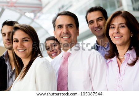 Group of successful business people lat the office